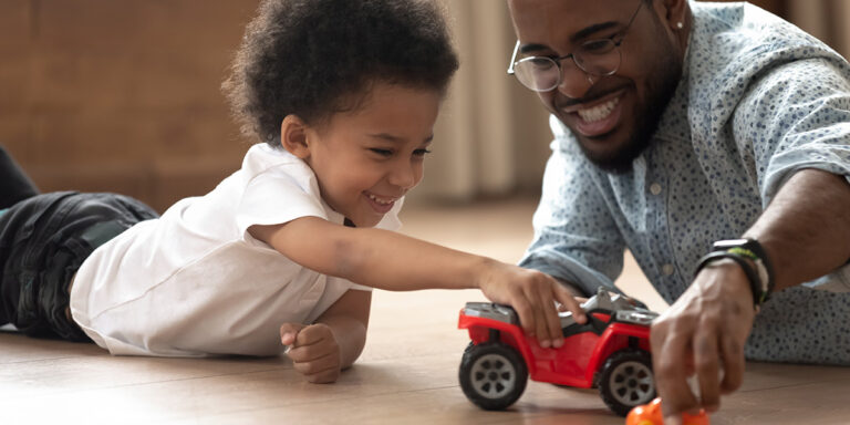 dad son spending time playing